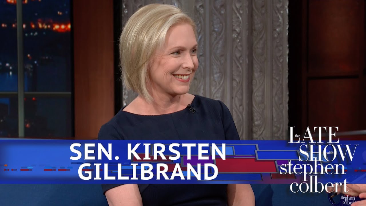 Kirsten Gillibrand smiling on a TV set during an interview.