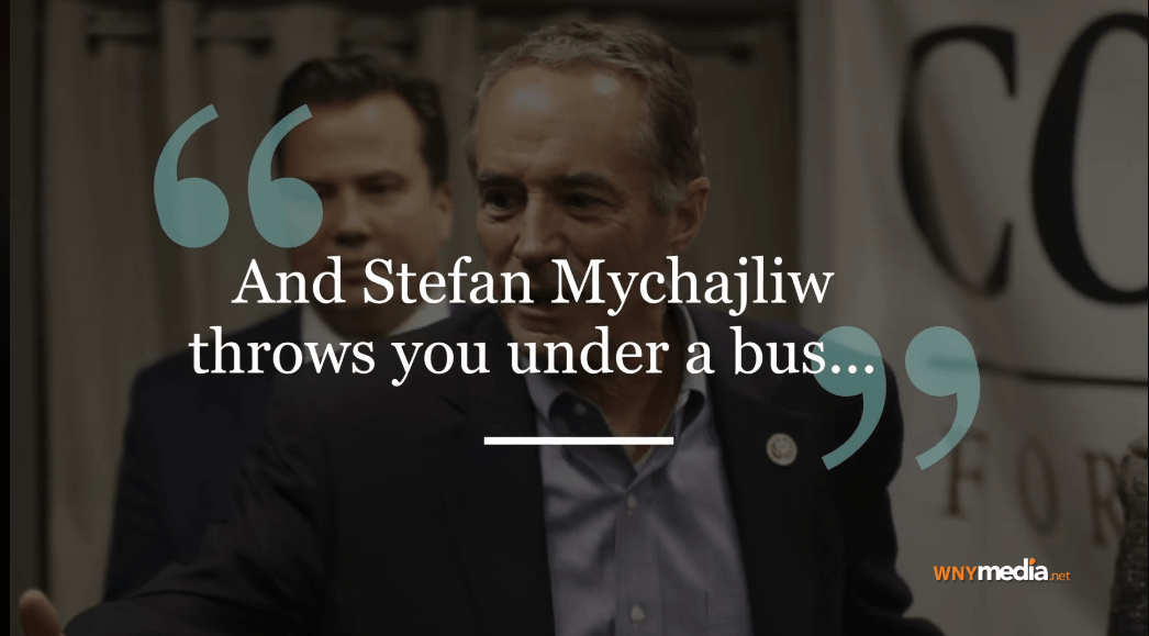 Two men in suits with a large quote overlay and WNYmedia.net watermark.