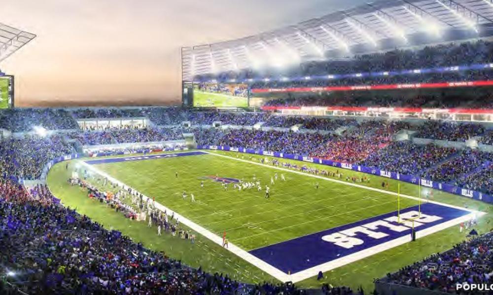 Large crowd in a stadium with a soccer field and painted end zone area