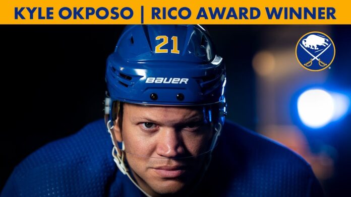 Hockey player in a blue helmet with “RICO AWARD WINNER” text above; Buffalo Sabres logo at top right.