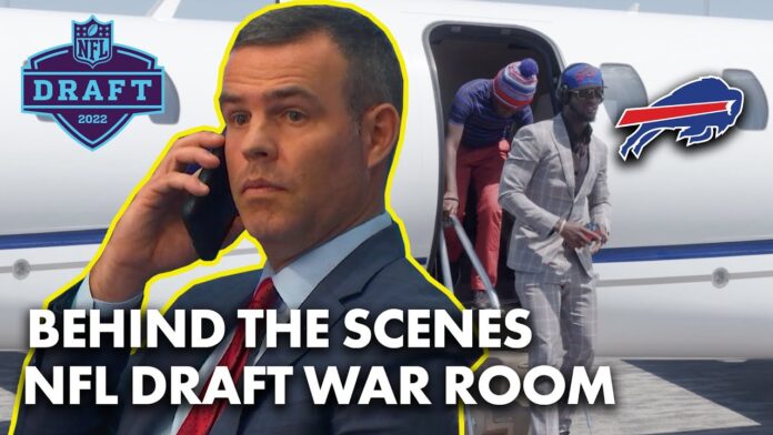 Man in a suit on a phone, with NFL Draft 2022 and Bills logos over a plane scene.