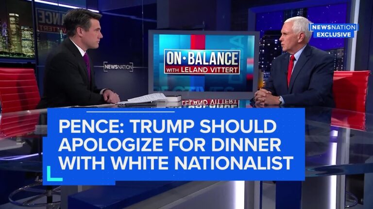 Two men sit at a news desk during a broadcast with “ON BALANCE” on screen.
