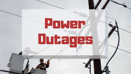 Graphic reading “Power Outages” over utility poles and power lines.