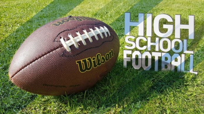 Brown football on green turf beside large “High School Football” lettering