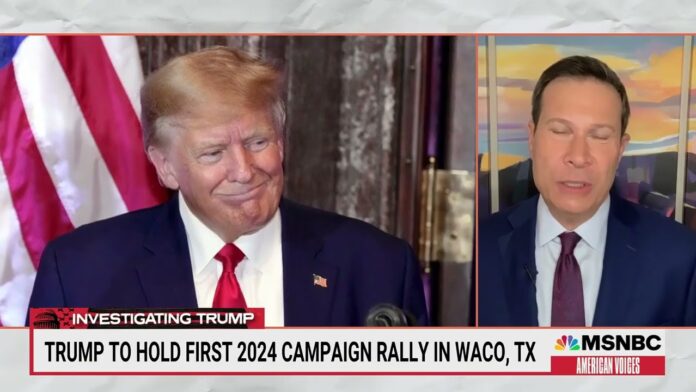 Split-screen shows a man in a suit with red tie beside an MSNBC host speaking.