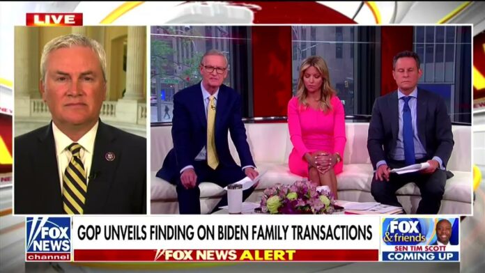 Split-screen shows three people seated on a TV news panel with a live label.