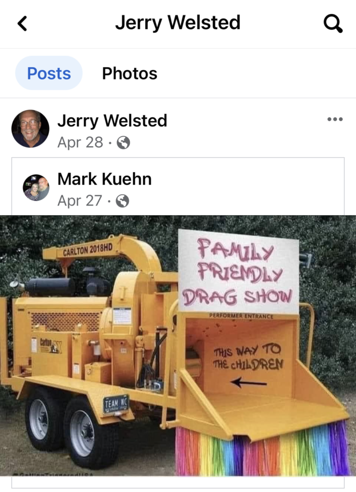 Yellow trailer entrance with sign reading “Family Friendly Drag Show” and arrow.