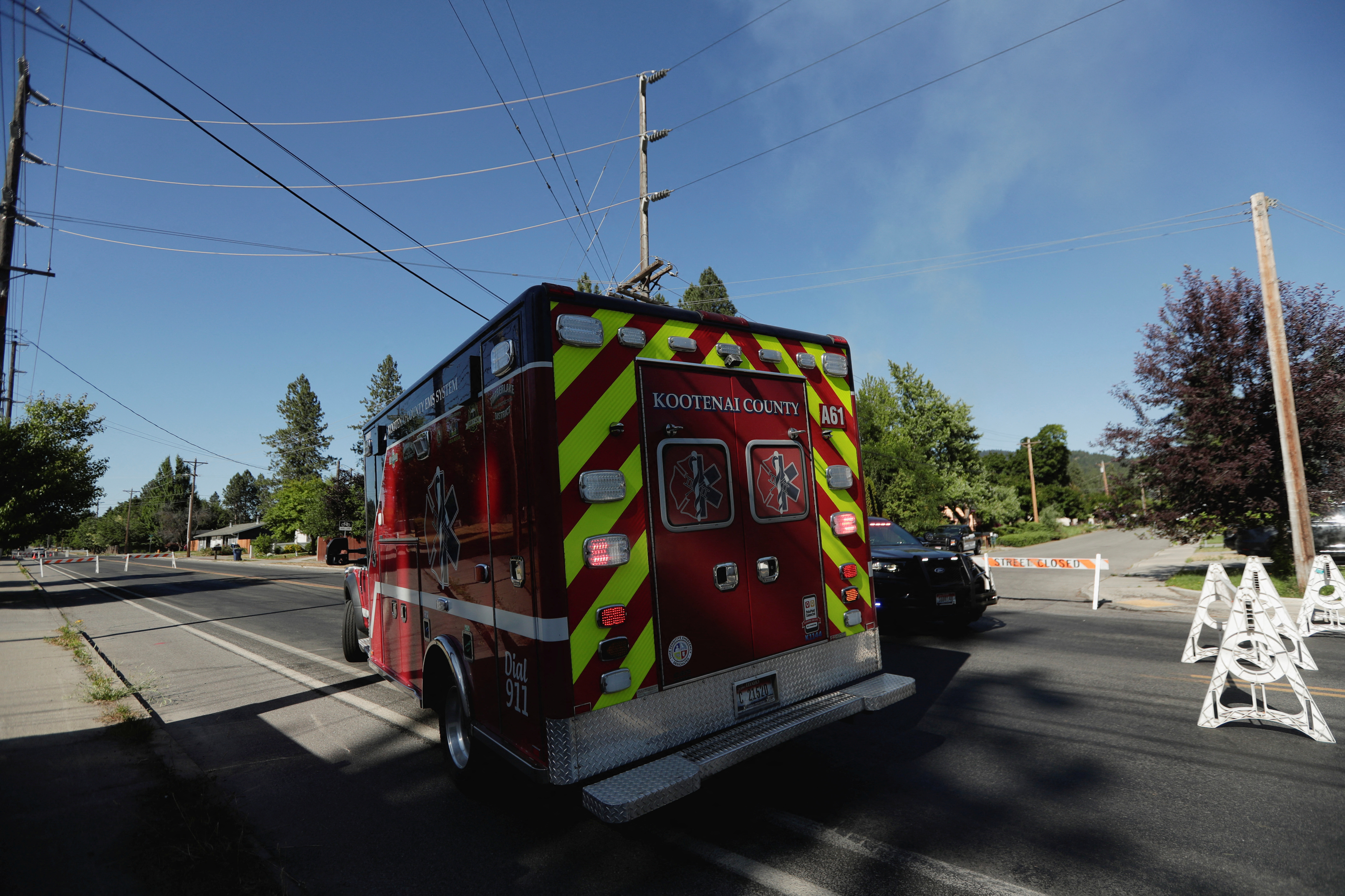 EMS vehicle drives along a street