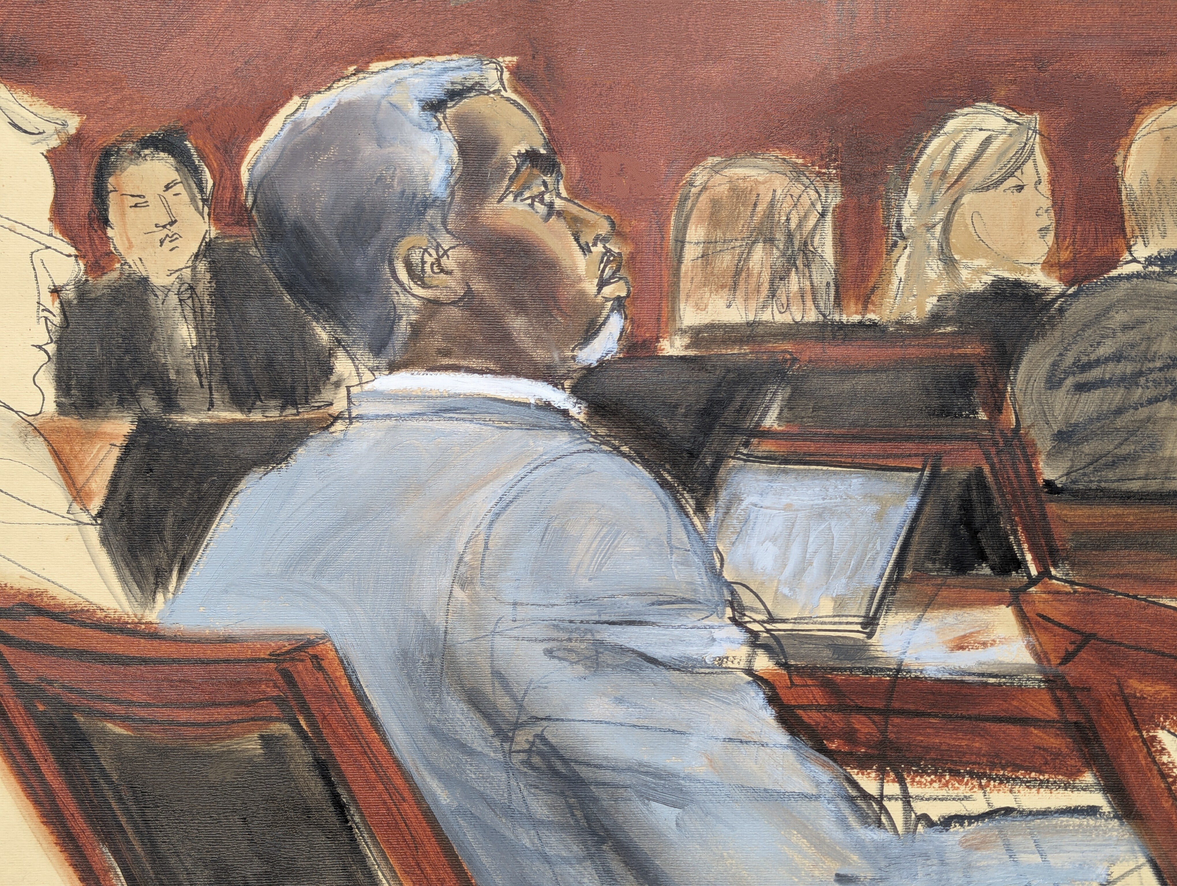 Sean Diddy Combs listens during opening statements on the first day of trial in Manhattan federal court, Monday, May 12, 2025, in New York. (Elizabeth Williams via AP)