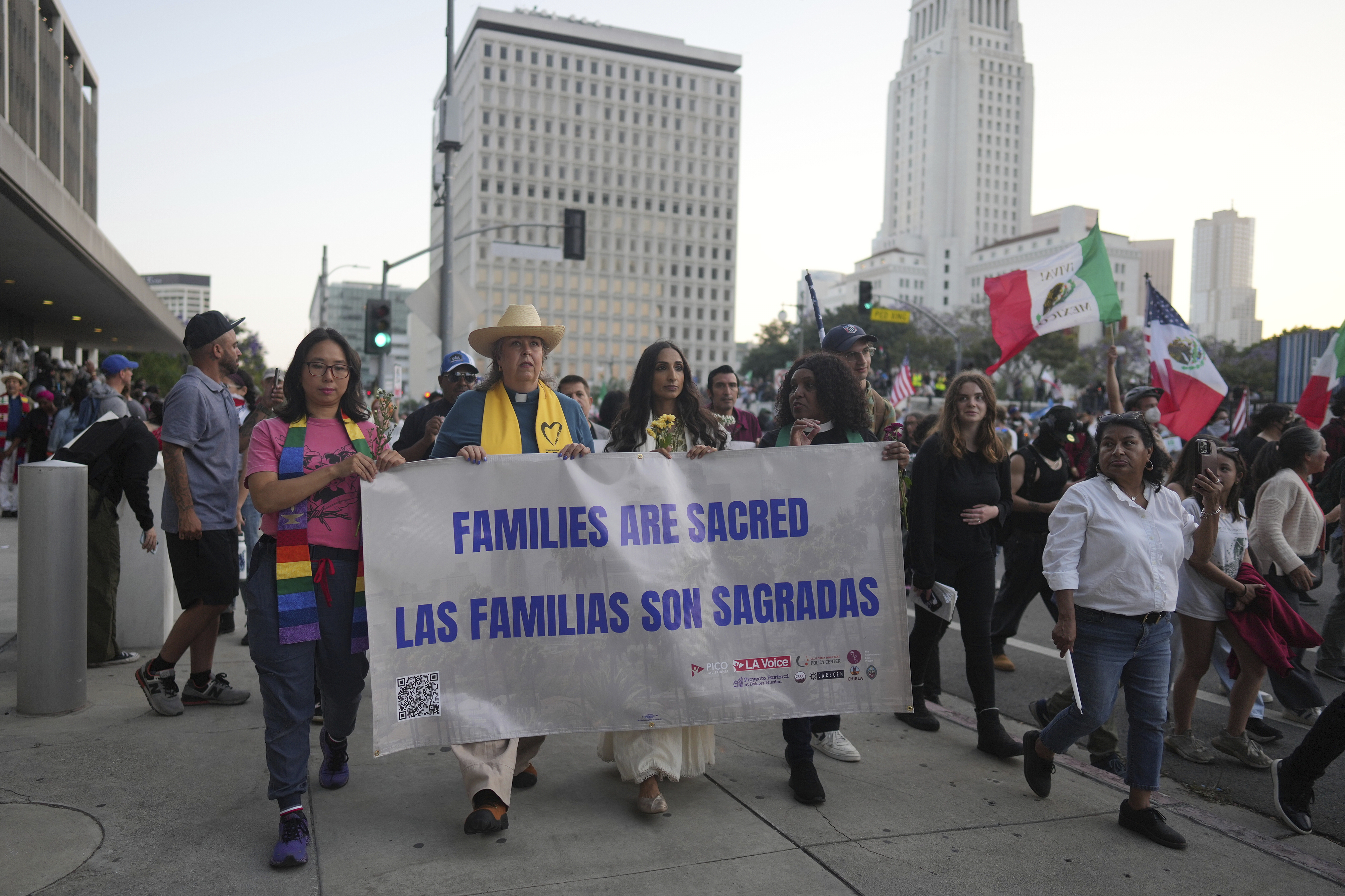 Demonstrators march during an anti-ICE protest