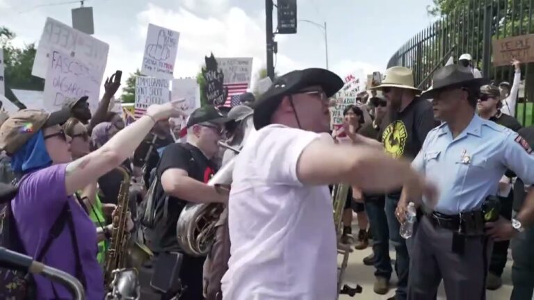 Musicians surround Proud Boys, drown them out with tubas at ‘No Kings’ protest in Atlanta